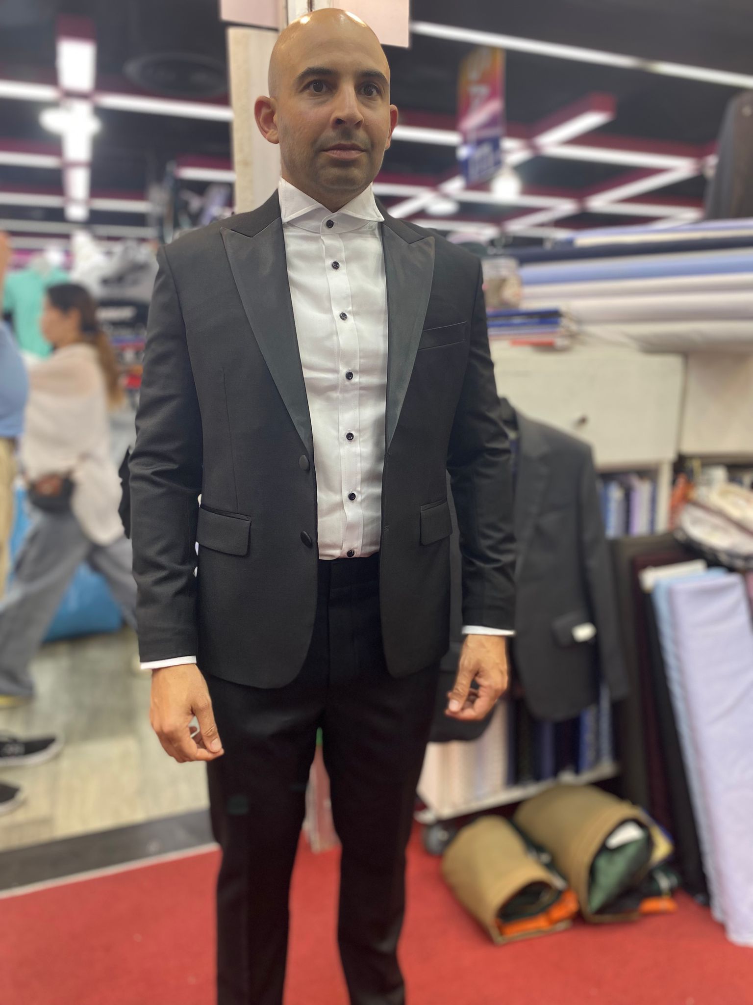 Happy client in custom tailored suit at King Fashion Uni Bangkok